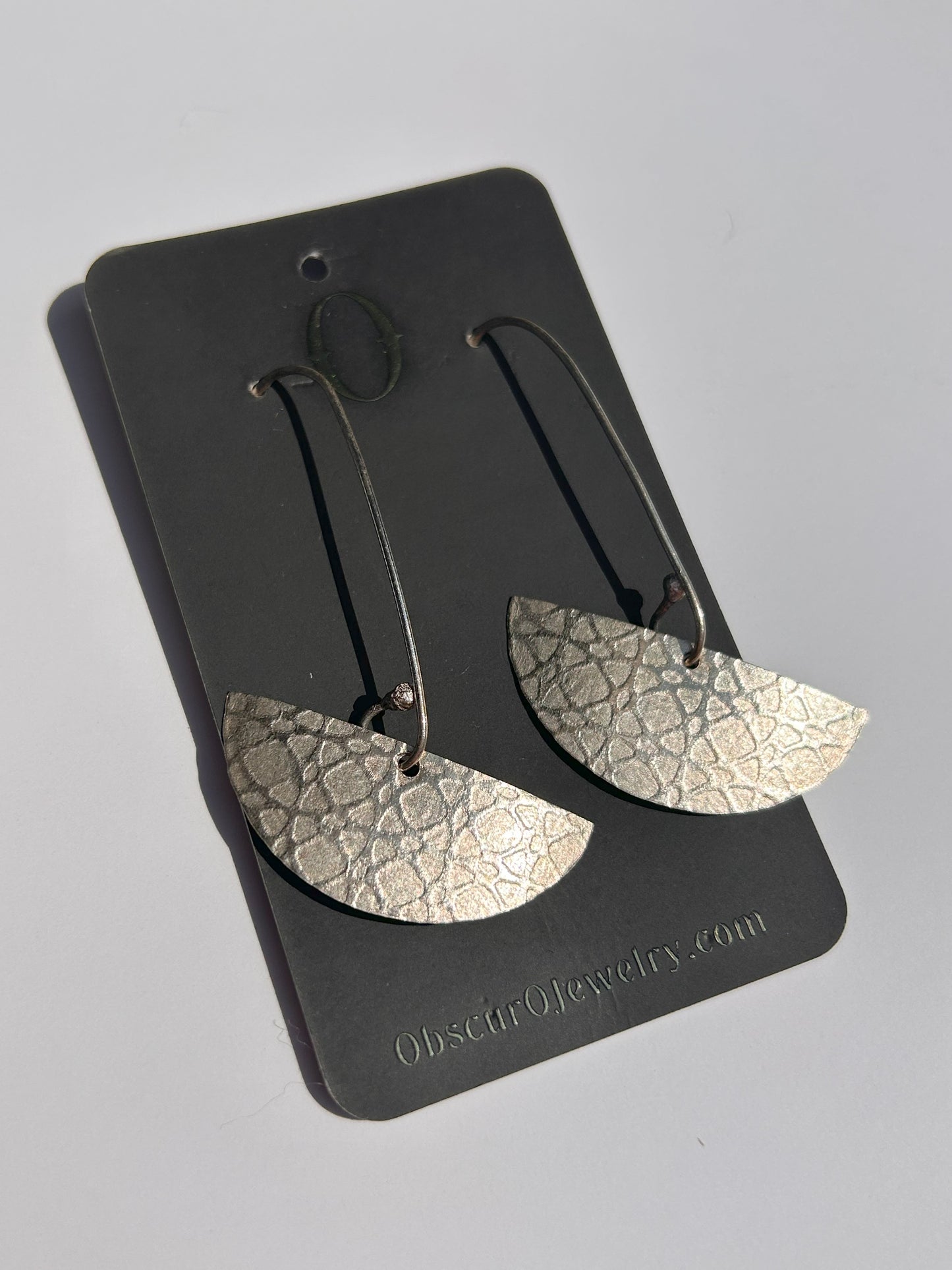 Obscuro Jewelry Half Circle Swingers