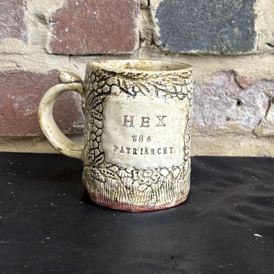 Ceramic mug with text 'HEX the Patriarch'